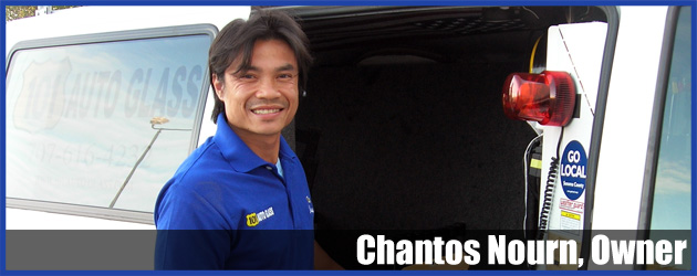 Chantos Nourn, owner of 101 Auto Glass, standing at the open door of his service van